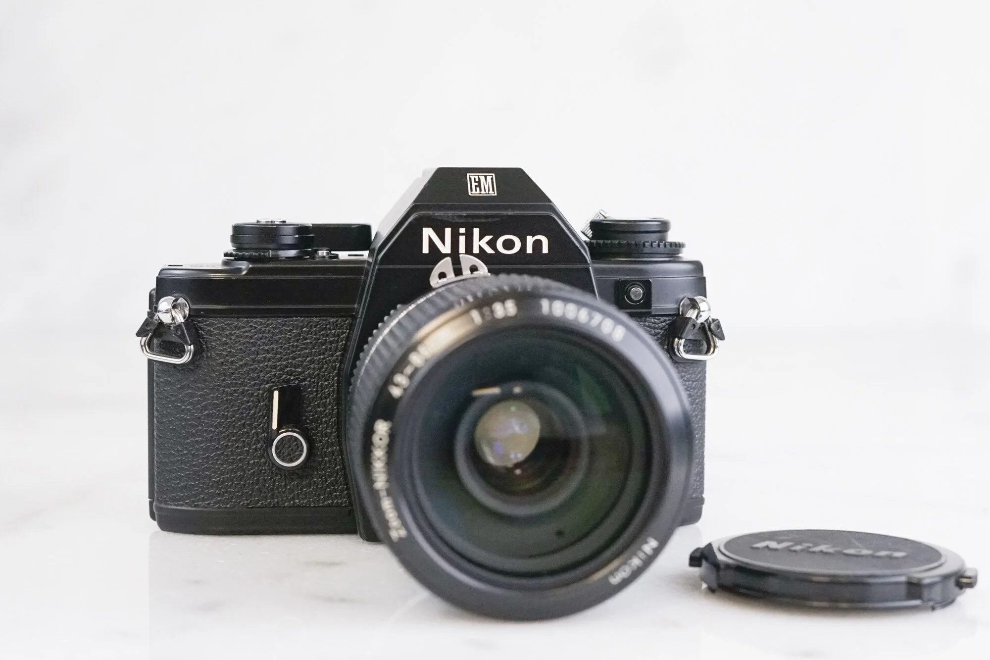 Nikon EM 35mm Film SLR Camera with Nikon Nikkor 43-86mm F/3.5 Zoom